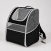Black and grey mesh pet backpack carrier with a top handle, shown on a plain background.