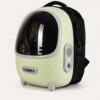 Pale green capsule pet backpack with a dark bubble window and black shoulder straps on a plain background.
