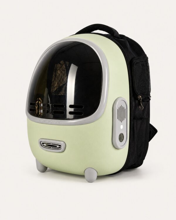 Pale green capsule pet backpack with a dark bubble window and black shoulder straps on a plain background.