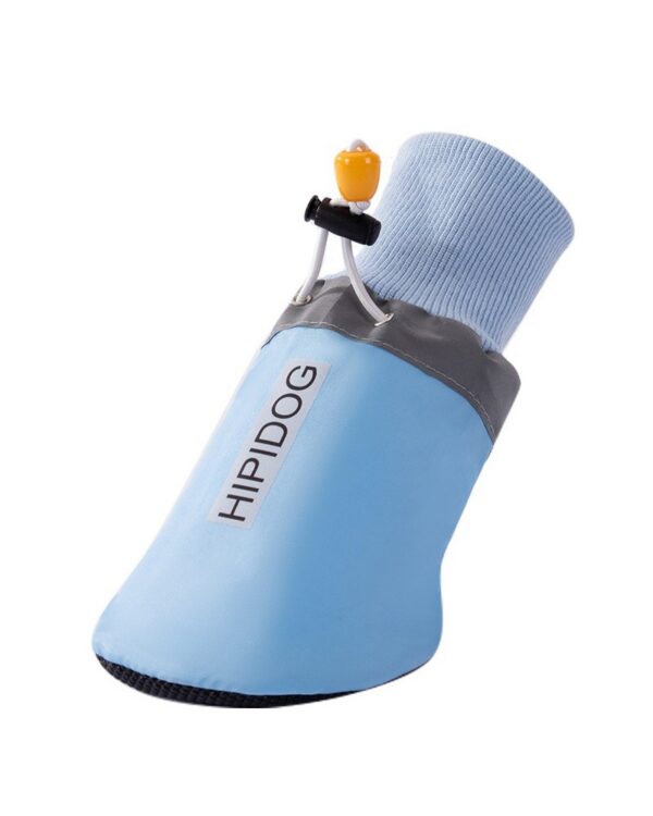 A single light blue dog paw boot shown with its cinch cord and toggle.
