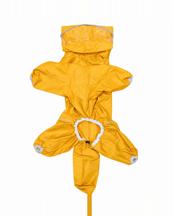 The yellow dog rain suit laid flat showing its underside cut and leg openings.