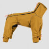 The mustard four-leg dog suit with a tall collar and back zipper on a pale gray background.